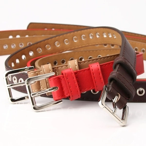 Women's faux leather belt set with rows of silver metal eyelets and classic pin buckles