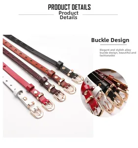 Detail of genuine leather belt with hollow star patterns and a gold alloy buckle