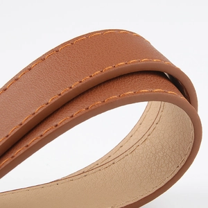 Brown leather belt for women with fine lychee texture and contrast stitching detail