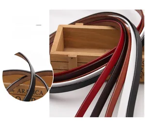 Detailed close-up showing the smooth oiled edge finish on various colored leather belts
