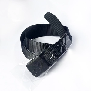 Close-up of black tactical nylon woven belt featuring a durable plastic buckle for daily wear