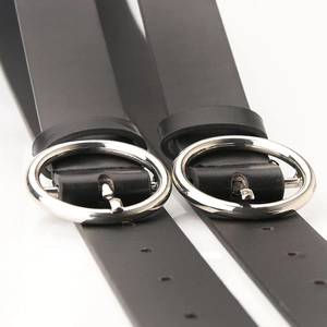 Classic black leather belts with round silver metal buckles and adjustable eyelets