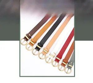 Detailed collection of slim women's belts with golden round buckles in eight versatile colors