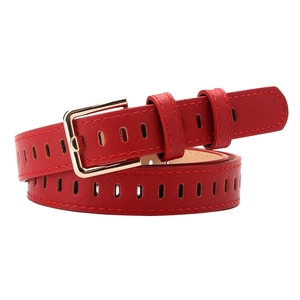 Red hollowed-out PU leather belt for women with a gold square buckle on white background
