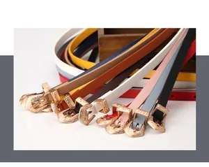 Detail of slim leather belts for women with vintage floral engraved gold alloy buckles