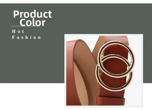 Détail d'une ceinture en cuir marron pour femme avec boucle élégante à double anneau doré