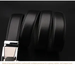 Close-up of black cowhide leather belt with silver automatic buckle and neat stitching