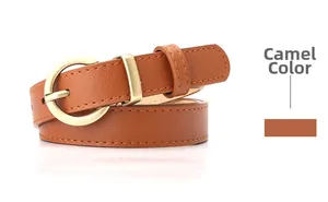 Close-up of camel leather belt featuring a round metallic pin buckle and fine stitching