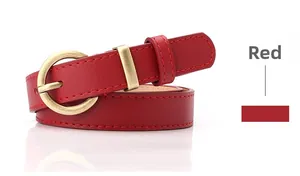 Close-up of women's red leather belt featuring a matte gold round buckle and red stitching
