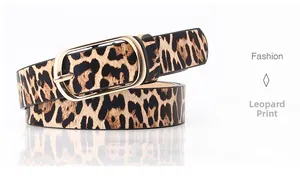 Detail of leopard print leather belt with a polished gold oval metal buckle