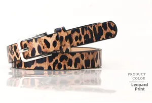 Detail of leopard print faux leather belt with a silver-tone rectangular metal buckle