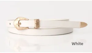 Detail of white matte PU leather belt with vintage golden floral engraved buckle set