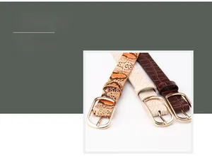 Detailed close-up of textured leather belts featuring gold square buckles and diverse patterns