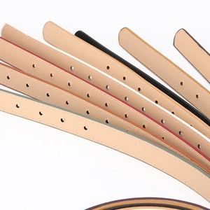 Close-up of slim 1.2cm leather belts with neat stitching and multiple color options