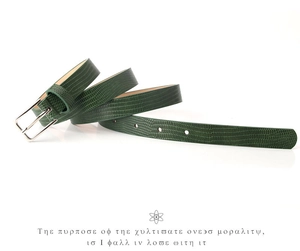 Detail shot of green lizard-patterned leather belt with silver square buckle and texture
