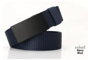 Detail of navy blue woven belt strap with matte black buckle on white background