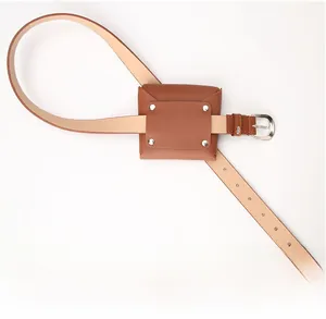 Detail of a brown leather belt with a mini square pouch featuring silver rivet accents