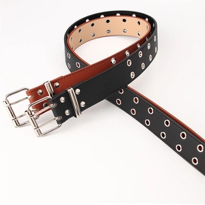 Détail de ceintures punk à double œillets en cuir PU noir et marron avec boucles argentées
