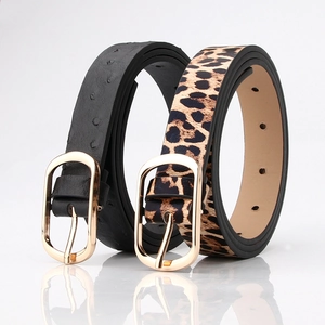 Women's black ostrich embossed and leopard print belts with golden oval pin buckles