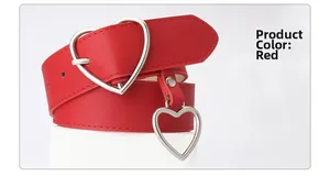 Detail of red textured faux leather belt with silver heart buckle and metal pendant