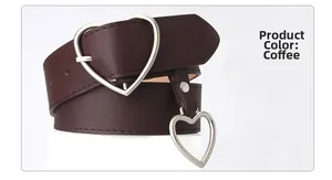 Detail of coffee brown leather belt with silver heart buckle and hanging charm
