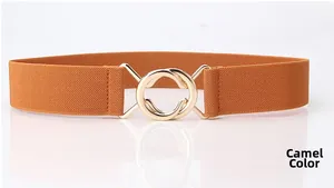 Detail of camel elastic belt featuring interlocking gold circular metal rings