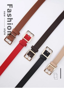 Detail of five multi-color slim leather belts featuring polished gold square buckles