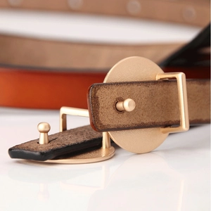 Elegant tan matte leather belt for women featuring a minimalist gold alloy buckle detail