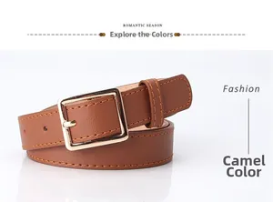Detailed view of the camel leather belt featuring a classic golden rectangular buckle