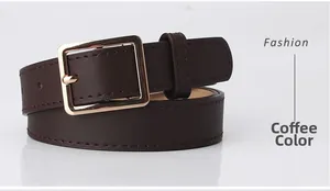 Detail view of a brown fashion belt featuring a polished gold square metal buckle