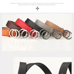Detailed row of women's leather belts featuring various colors and silver double ring buckles
