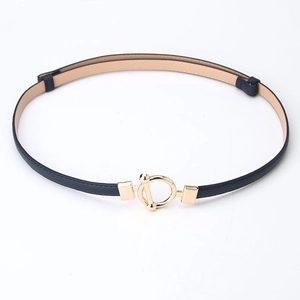 Women's slim black leather belt with a modern round gold metal T-bar buckle