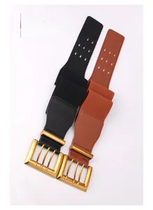 Details breiter elastischer Taillengürtel in Schwarz und Braun mit Gold-Schnallen