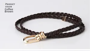 Detail of coffee brown braided thin belt with a light gold U-shaped metal buckle