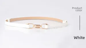Close-up of white leather dress belt for women with elegant gold interlocking metal buckle