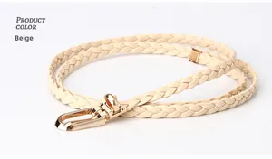 Detail of beige braided waist belt with gold metal buckle on a clean white background