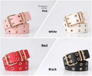 Detail view of four fashion belts in pink, white, red, and black with double grommet holes