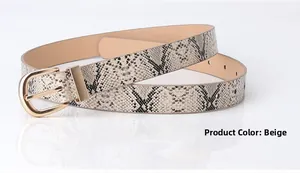 Close-up of beige snake skin texture belt with a polished gold metal buckle