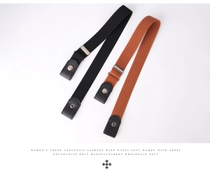 Detail view of elastic waist belt set with black and brown straps and metal snap buckles