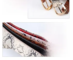 Detail view of various animal prints and golden metal U-shaped buckles on PU leather belts