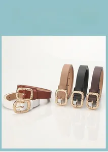 Set of five skinny belts for women featuring textured gold buckles in assorted neutral colors