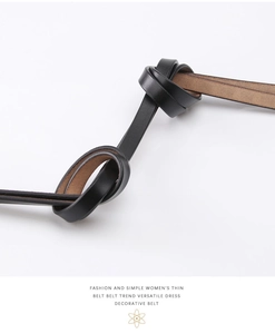 Detail of soft black leather women's thin belt showing flexible knot and fine texture