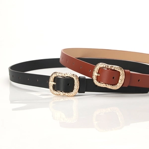 Women's vintage fashion belt with black and brown leather straps and gold carved buckles