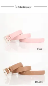 Dettaglio delle cinture in ecopelle rosa e kaki con eleganti fibbie quadrate con perle