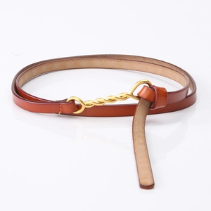 Slim reddish brown leather belt for women with elegant golden twisted buckle design