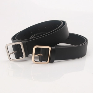 Minimalist black belts with square silver and gold buckles on a white background