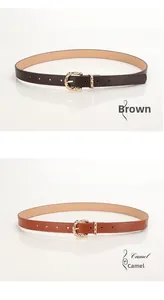 Detail of slim brown and camel PU belts with vintage gold bamboo-style metal buckles