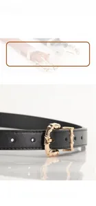 Close-up of premium gold bamboo-shaped alloy buckle on a slim faux leather belt