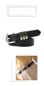 Detail of a thin black leather belt with silver square buckle and rectangular metal accents