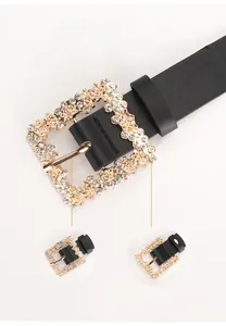 Detail of elegant black PU leather belt featuring a crystal-encrusted gold alloy buckle